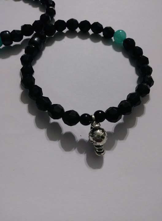 "Global" wrist bracelet (Spinning globe charm piece included)